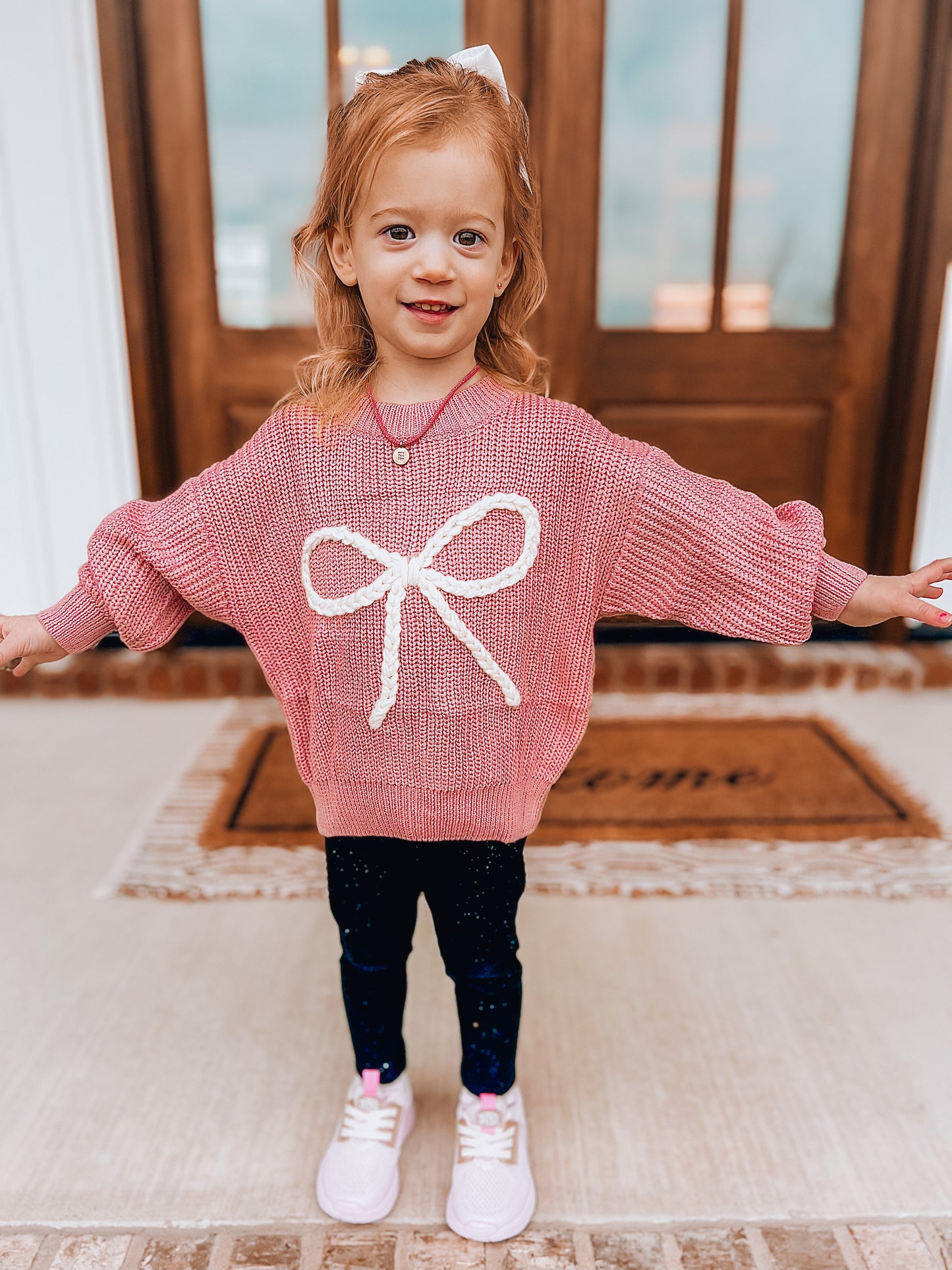 "bow"-tiful knitted sweater